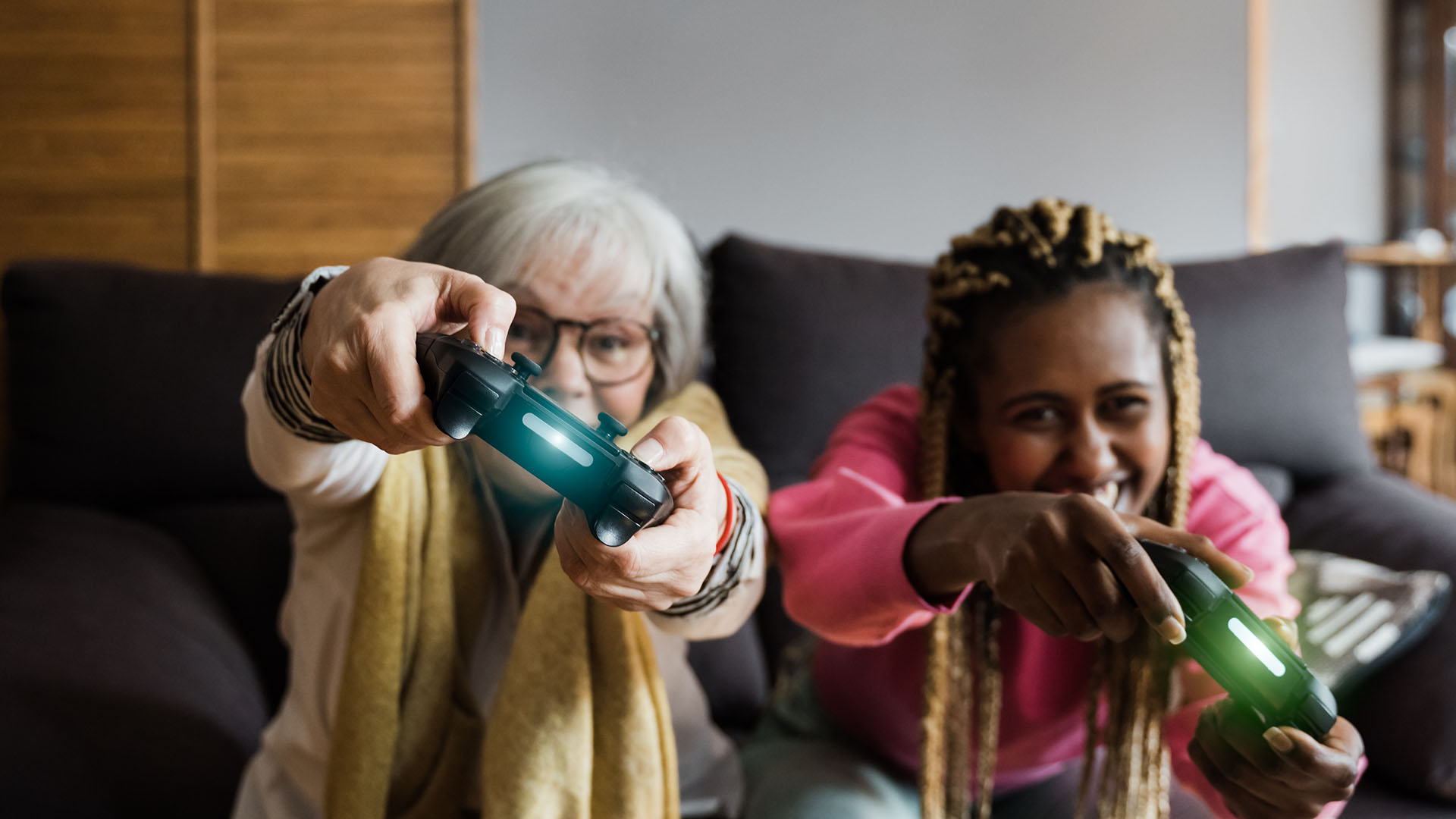 two women play video game