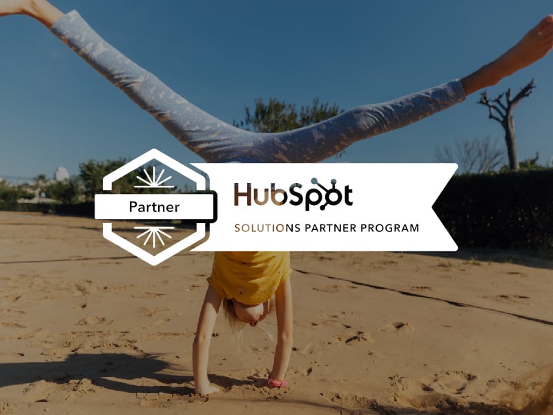 Person doing handstand on the beach with a white graphic overlay that reads