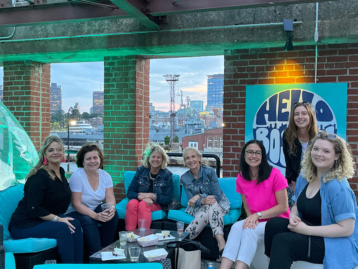 The Tier One Boston team at a rooftop bar