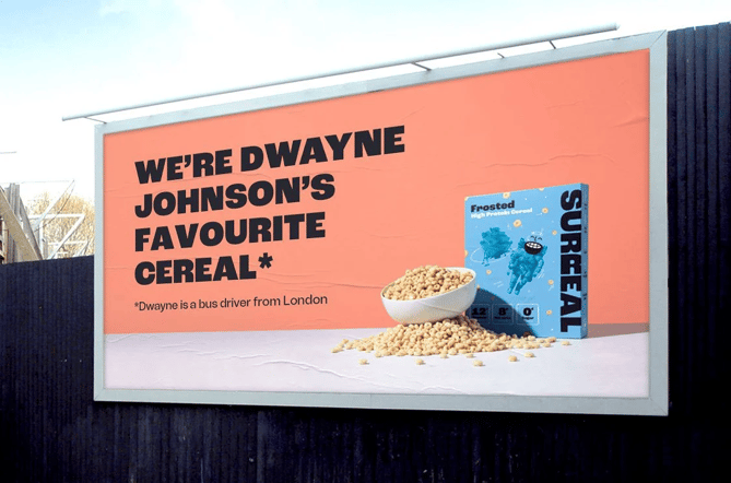 A billboard advertising cereal that says "We're Dwayne Johnson's favorite cereal. *Dwayne is a bus driver from London."