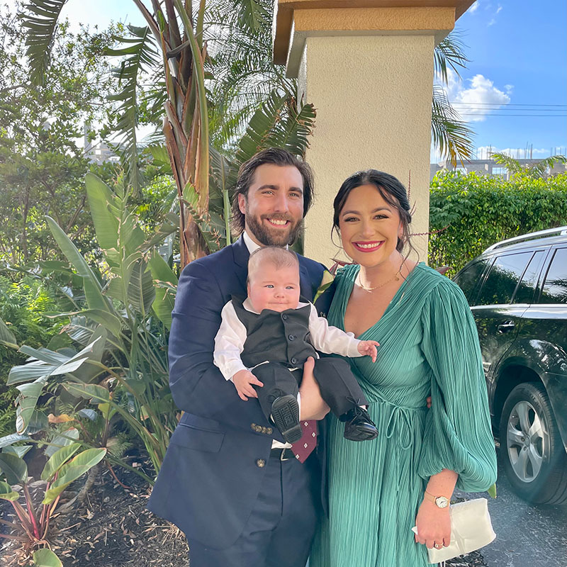 Allison with her husband and baby son