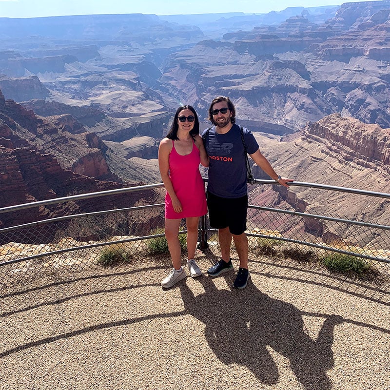 Allison and her husband with scenic nature background