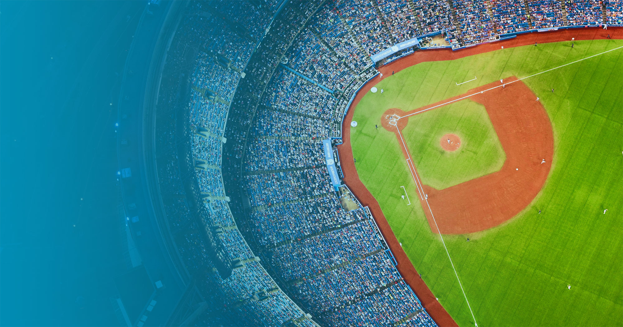 Aerial view of a crowded baseball stadium during a baseball game