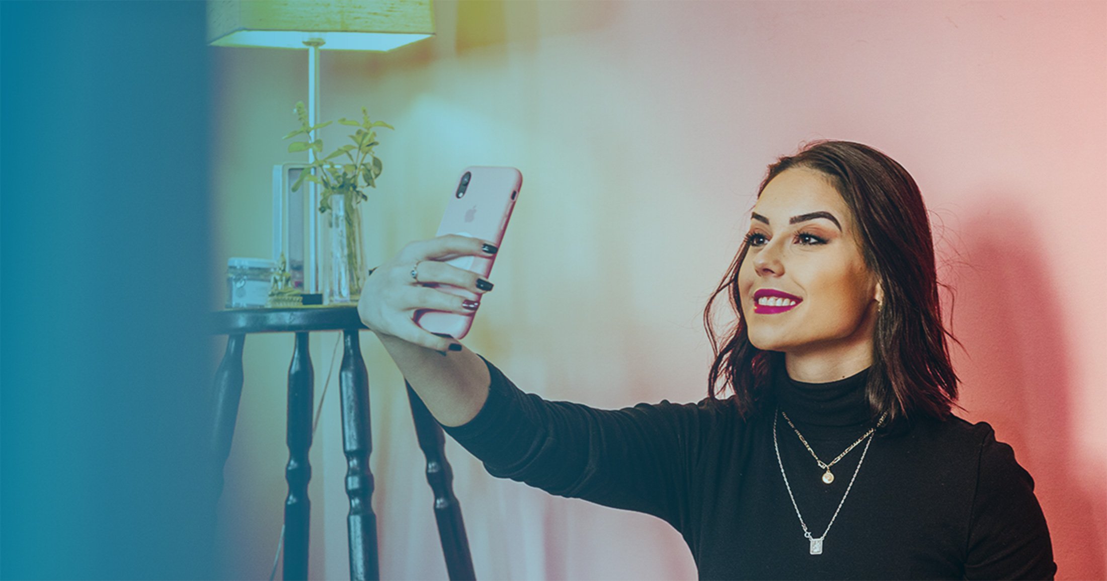 Young woman influencer taking a selfie