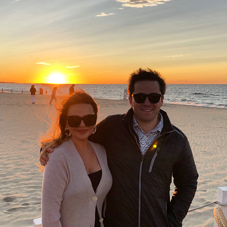 Celena and her husband on the beach