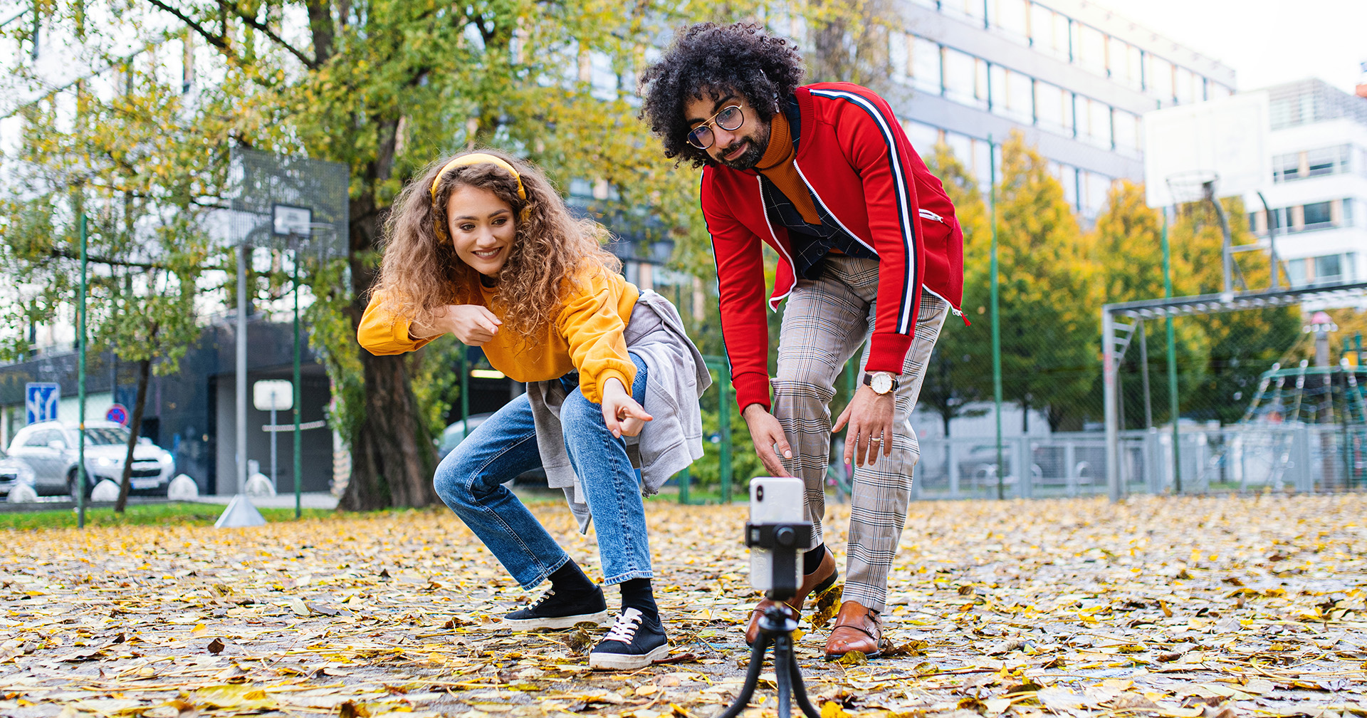 Friends filming content on phone