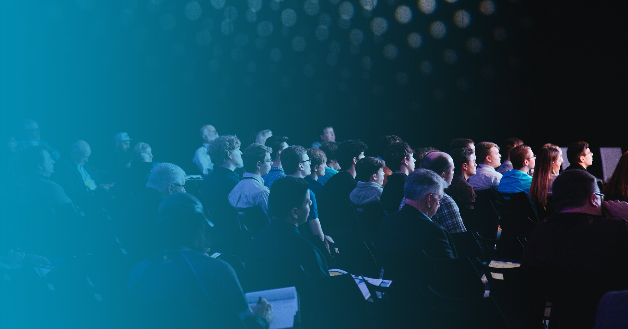 Captivated audience at a public speaking presentation